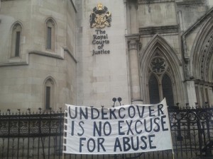 'Undercover is no Excuse for Abuse' banner at the High Court