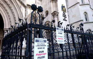 Campaign Opposing Police Surveillance: Placards outside the spycops hearing, Royal Courts of Justice