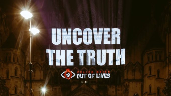 'Uncover The Truth' projected on the Royal Courts of Justice