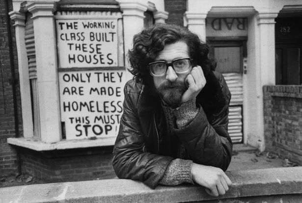 Piers Corbyn outside houses in Shirland Road, Maida Vale, London, which were barricaded by the squatter occupants against impending eviction, November 1975