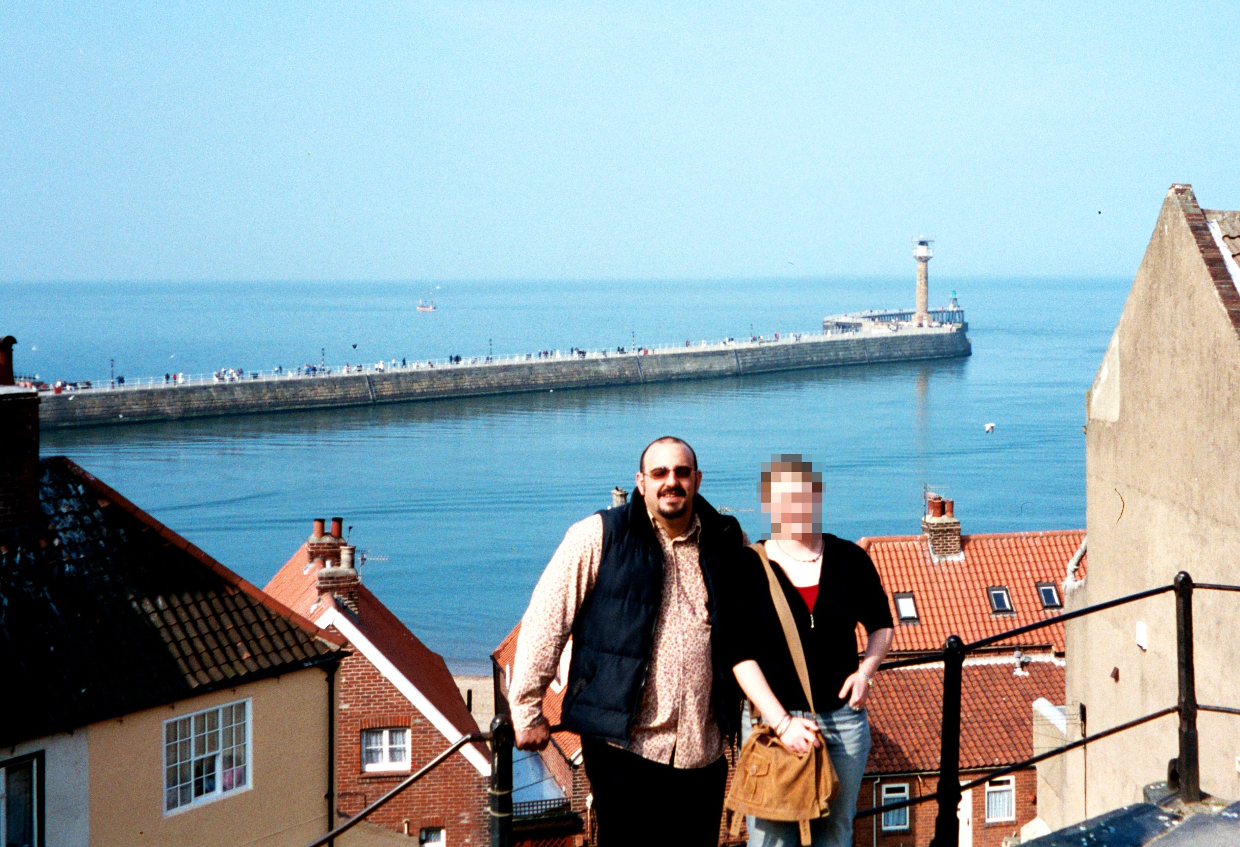 Carlo Soracchi at Whitby harbour with Donna McLean's sister, March 2003.